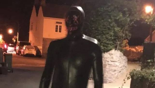 The 'Masked Gimp Man' appears to scare people at night, running up to them and standing menacingly. Credit: Handout