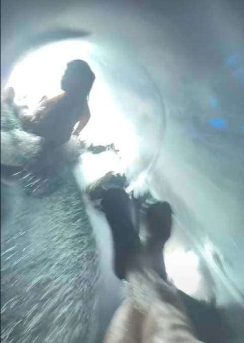 The filmer accidentally collided with a girl at the bottom of the slide. Credit: TikTok/@adrian_lionsonly