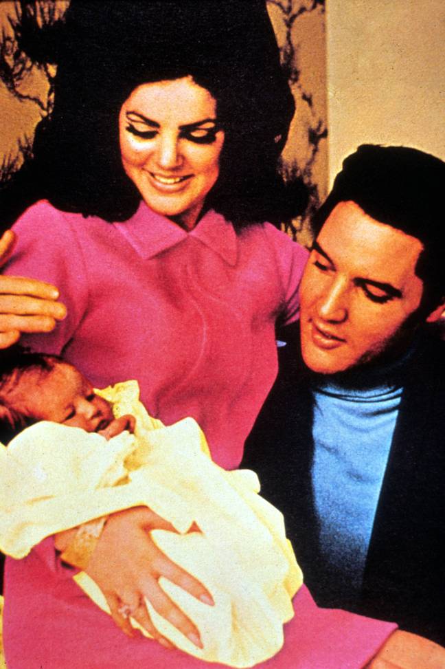 Lisa Marie with parents Priscilla and Elvis Presley. Credit: Moviestore Collection Ltd / Alamy Stock Photo