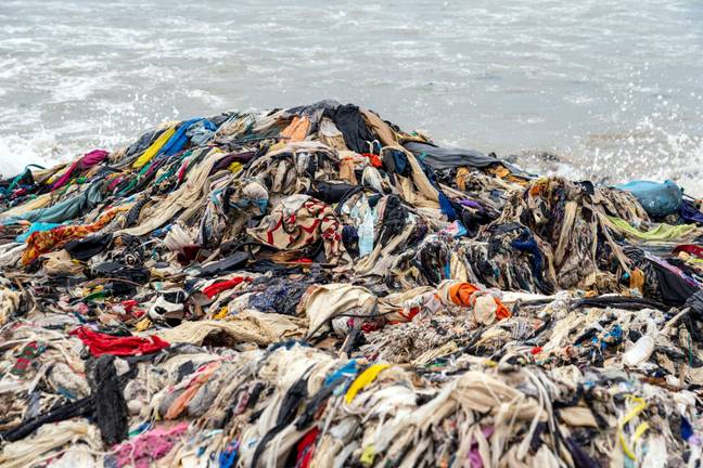 A mountain of unwanted clothes is clogging up the beaches of Ghana's capital city. Credit: Muntaka Chasant/Shutterstock
