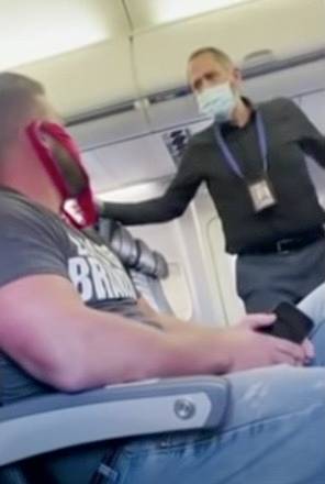 He was booted off the flight for refusing to comply with the rules. Credit:Adam Jenne/NBC News