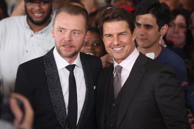 Simon Pegg and Tom Cruise. Credit: Alamy
