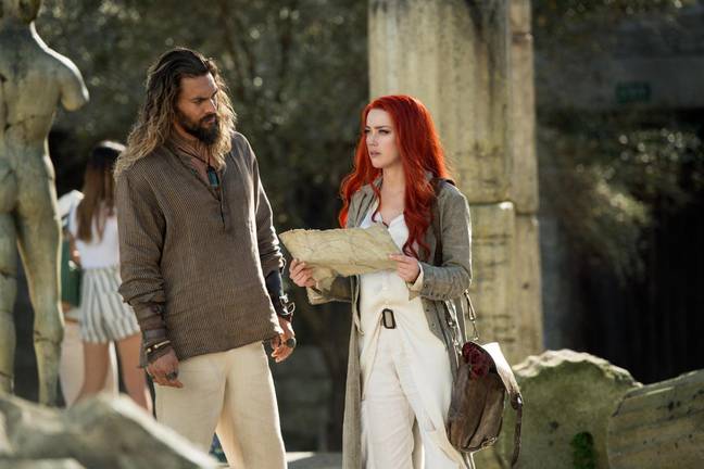 It has been claimed Amber Heard only kept her role in Aquaman 2 due to co-star Jason Momoa. Credit: Alamy