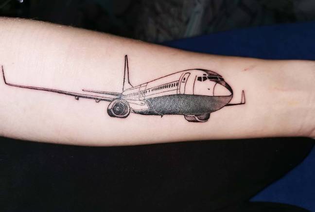 Sarah even has two tattoos of her plane 'boyfriend'. Credit: Mercury Press and Media