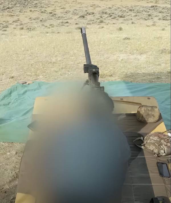 'Winston' used a custom made rifle to shoot the eight inch bullseye. Credit: Normad Rifleman Extreme Long Range Shooting/ YouTube