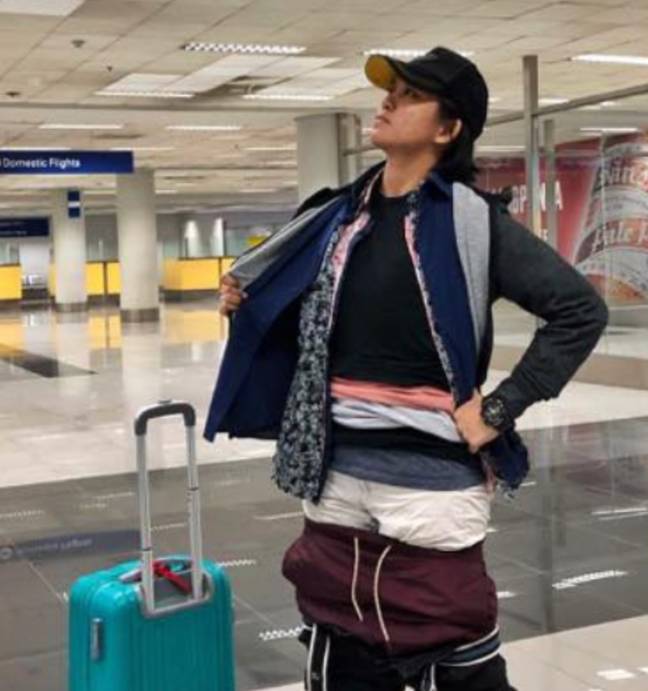 While looking only a bit ridiculous, Gel managed to get out of paying the extra baggage fee. Credit: Facebook/Gel Rodriguez
