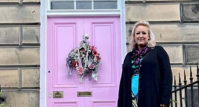 The mum is facing a big fine if she doesn't repaint the door. Credit: SWNS