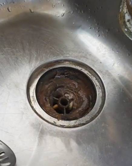 The sink was disgusting, with the content creator also describing the bad smell. Credit: @cultrostore/TikTok