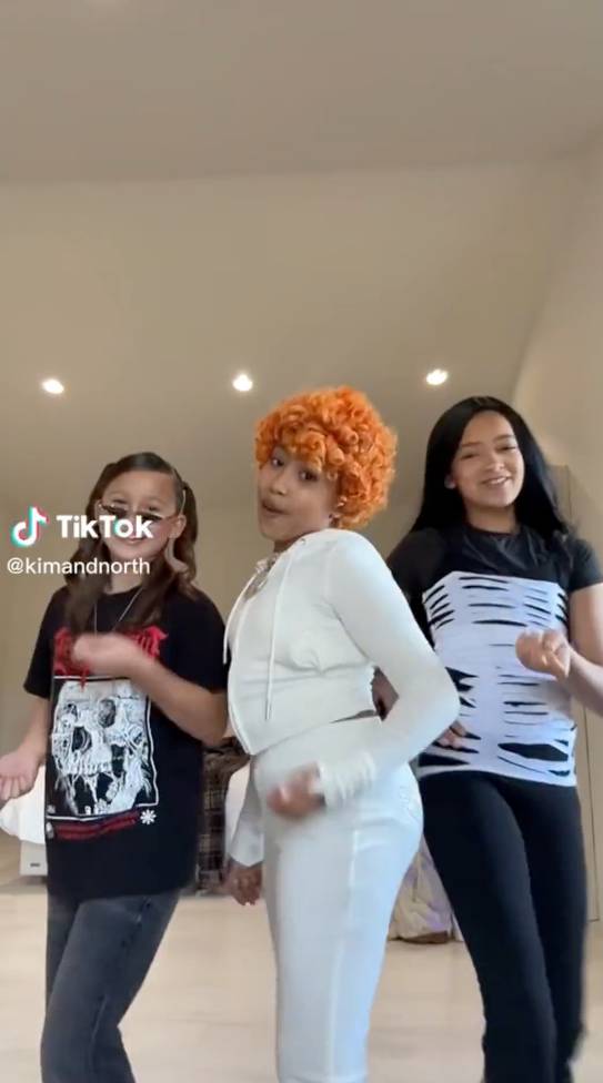 Kardashian fans have leaped to the defence of a new TikTok showing North West dancing with her friends to 'in ha mood' by Ice Spice. Credit: TikTok/kimandnorth
