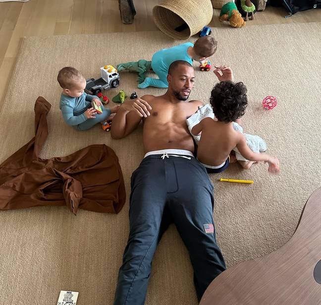 Ashley's husband Justin Ervin and their three children. Credit: @ashleygraham/Instagram