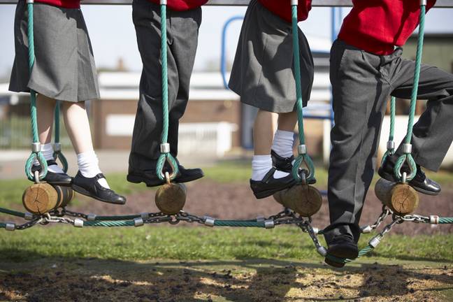 Parents have been urged to not upload pictures of their children in their school uniform on social media. Credit: Shutterstock