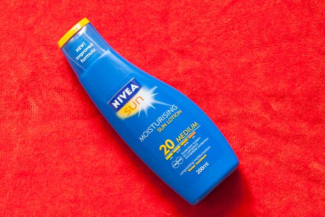 People should be aware of the symbol on the back of sun cream bottles. Credit: Alamy.