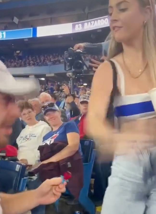 The girlfriend slapped her partner before sloshing her drink all over him. Credit: @canadianpartylife/TikTok