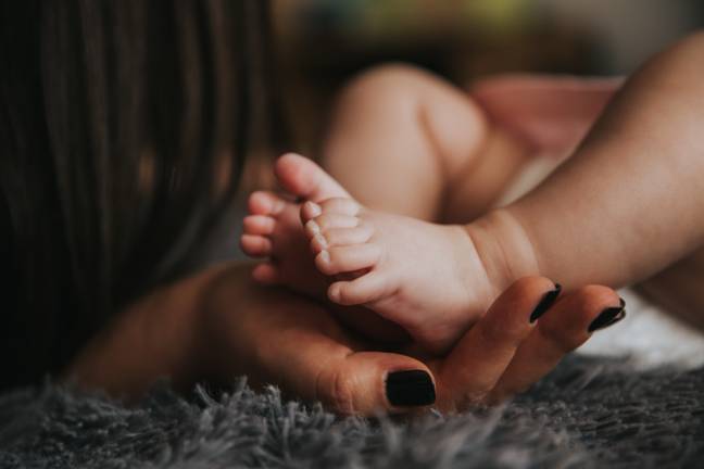 Baby Noah fell from his mum's bed onto blankets and pillows on the floor. Credit: Pexels
