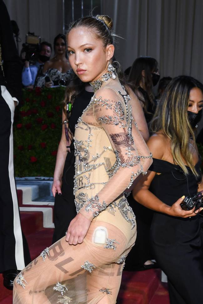 Met Gala fans have praised Lila Moss for showcasing her insulin pump and continuous glucose monitoring device beneath her gown (Alamy).