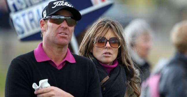 Liz Hurley and Shane Warne dated from 2011 to 2013. (Credit: Alamy)