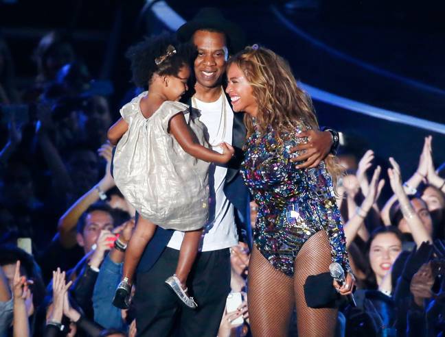 Blue Ivy with her famous parents, Jay-Z and Beyoncé. Credit: Alamy