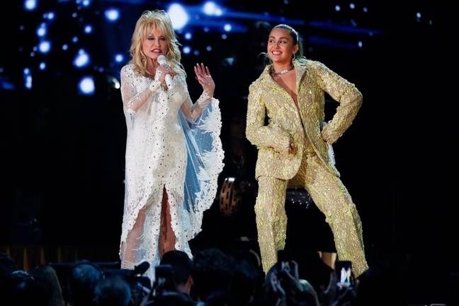 Miley Cyrus and Dolly Parton. Credit: REUTERS/Alamy