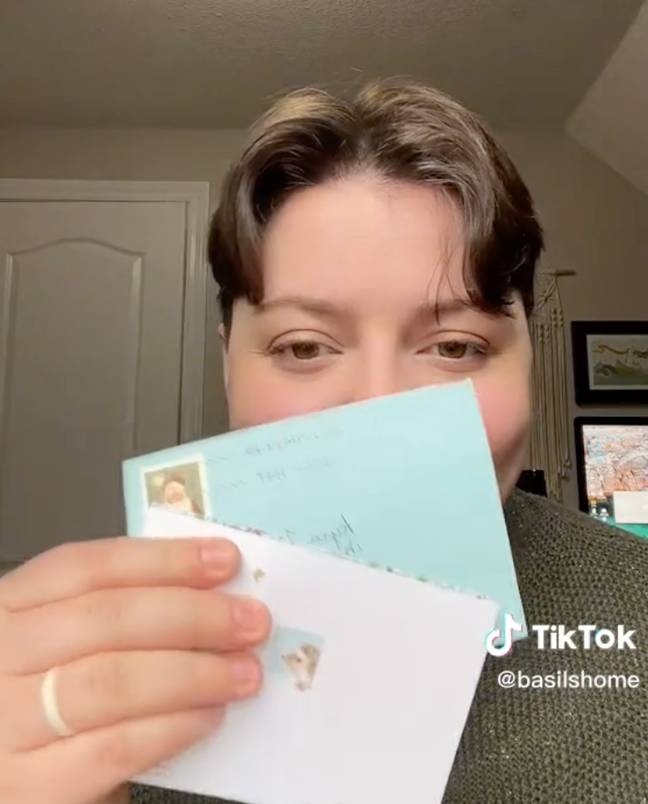 The TikToker received a letter addressed to them and their partner from her mum, dad and dog. Credit: @basilshome/TikTok