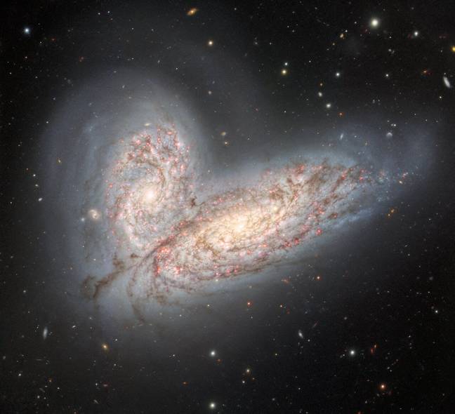 This image was captured last year and shows two spiral galaxies -  NGC 4568 and NGC 4567 - crashing into each other. Credit: International Gemini Observatory / NOIRLab / NSF / AURA