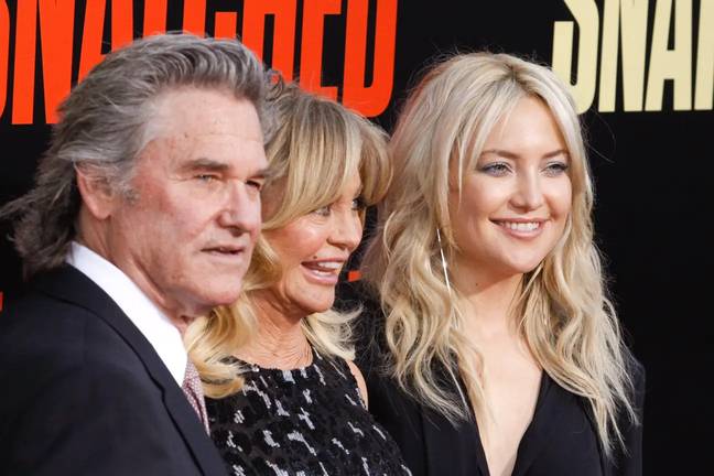 Kate Hudson with Goldie Hawn and Kurt Russell. Credit: PictureLux/The Hollywood Archive/Alamy Stock Photo