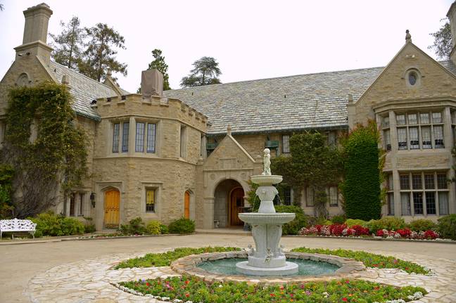 The Playboy Mansion, where women couldn't stay out past 9pm and were subjected to Hugh Hefner's fake cry to manipulate them into sex. Credit: Storms Media Group/Alamy Stock Photo