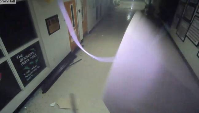 The video shows the school being hit by the tornado on Friday night. Credit: Facebook/Sam Strickland 