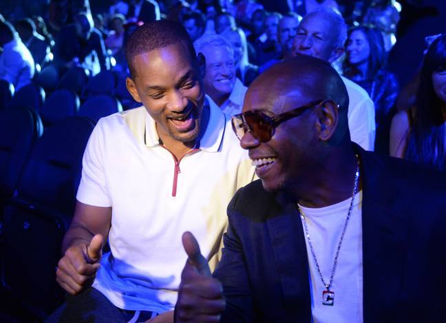 Will Smith and Dave Chappelle pictured in 2018. Credit: Sipa US / Alamy Stock Photo