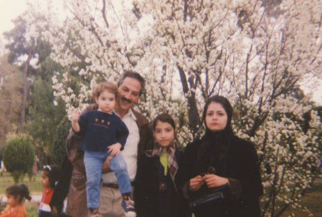 Sahar aged 10, with her mum, dad and sister. The family fled Iran when she was 12. Credit: Sahar Zand