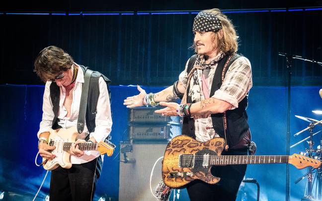 Depp travelled with musician Jeff Beck after the court case ended. Credit: Anne-Marie Forker / Alamy Stock Photo