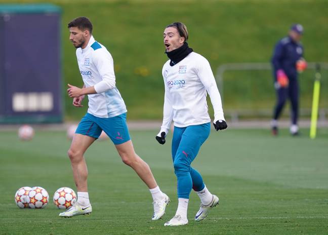 Jack Grealish and Ruben Dias in Manchester City training. Image: PA