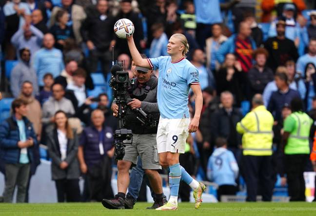 Haaland walks off with the match ball at the end of the Manchester derby, he already has three. Image: Alamy