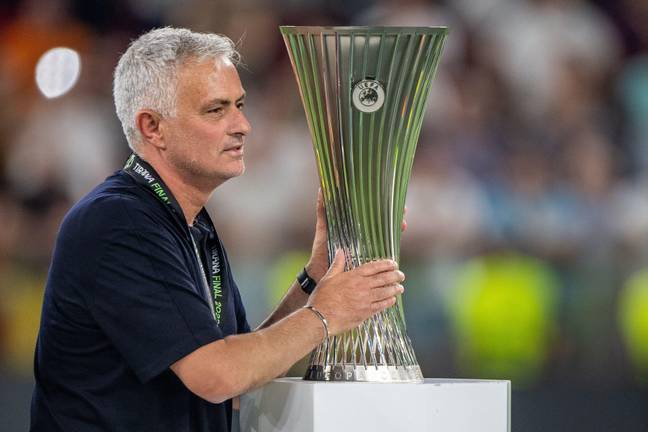 Mourinho with his most recent trophy. Image: Alamy