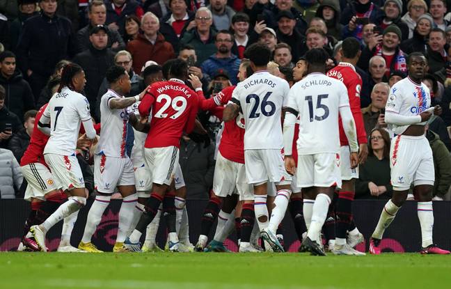 United and Palace players clash during the game. Image: Alamy