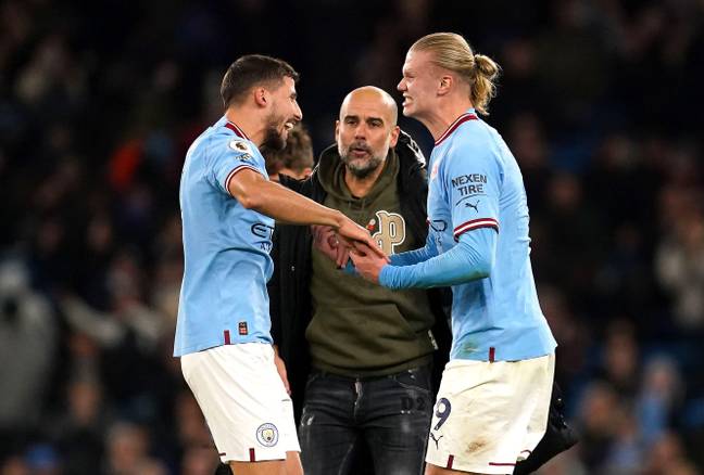 Guardiola with Ruben Dias and Haaland at full-time against Fulham. (Image Credit: Alamy)
