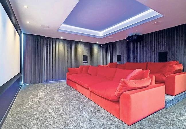 The luxurious mansion even has its own cinema where the family can unwind