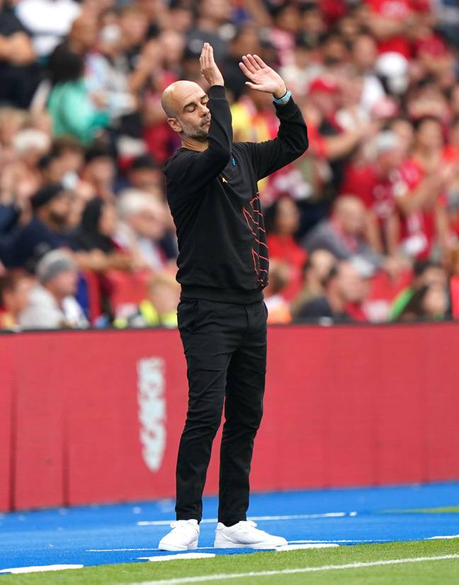 Pep Guardiola reacts on the touchline (PA Images/Alamy)