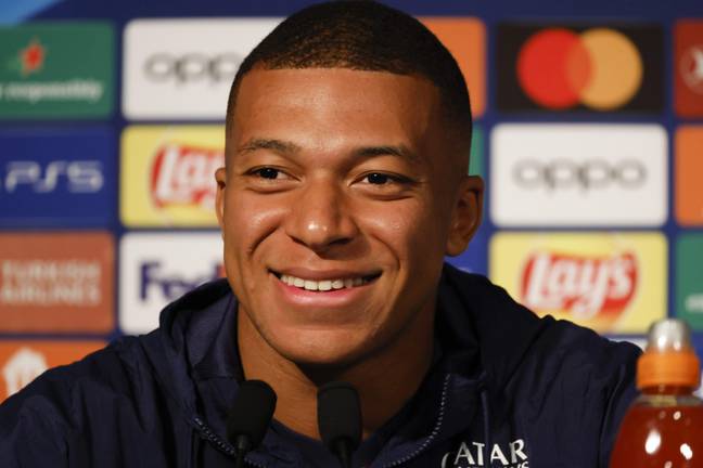 Mbappe in a PSG press conference. (Image Credit: Alamy)