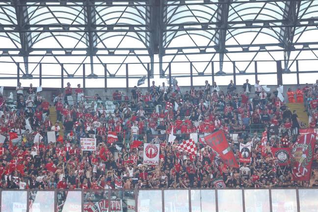 Monza fans enjoy their first league visit to the San Siro. Image: Alamy