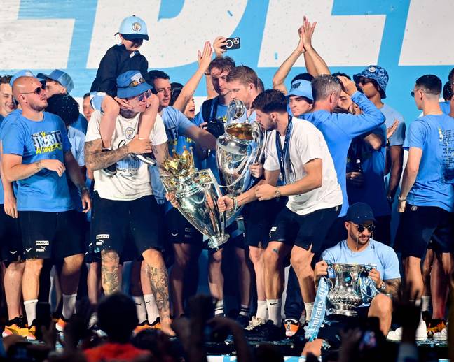 City celebrate with their trophy haul. Image: Alamy