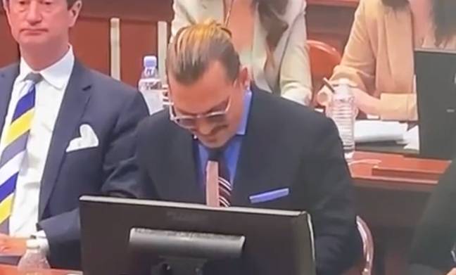 Johnny Depp could be seen laughing as Heard talked about his breath. Credit: Law and Crime Network