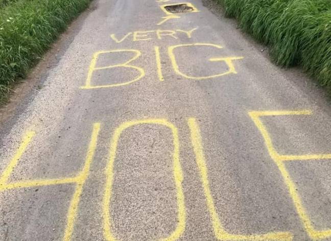TrivDaily - Mystery 'artist' warns drivers with very clear message 59 The council has said the pothole will be fixed. Credit: Facebook
