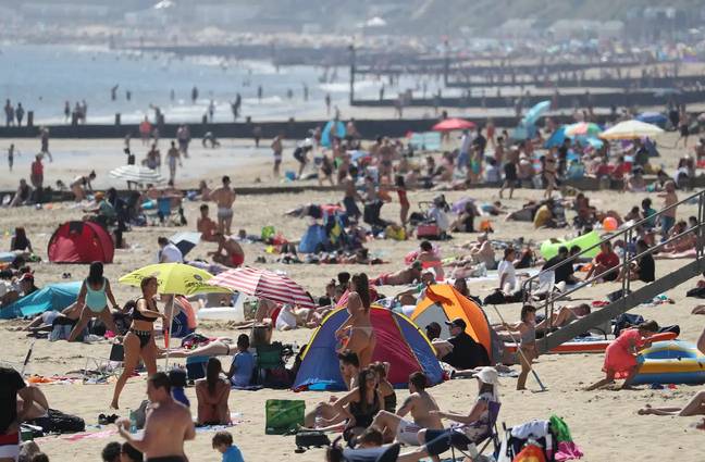 Brits will most likely flock to nearby beaches to catch the glorious rays. Credit: PA