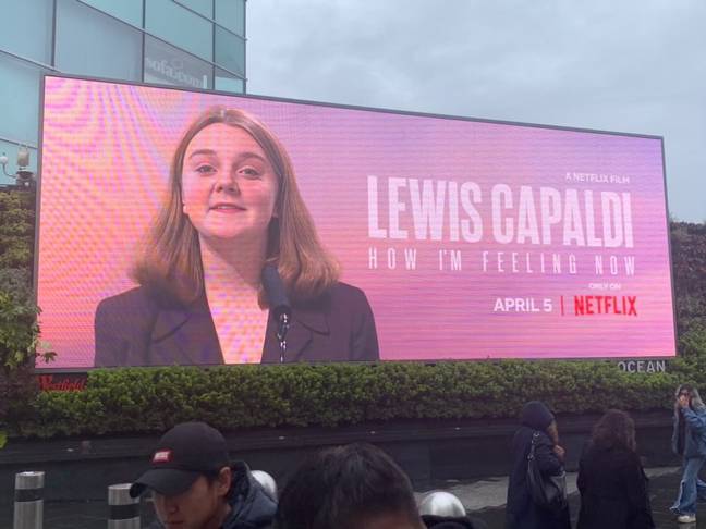 The billboard featured an image of a young Liz Truss. Credit: Twitter/@LewisCapaldi