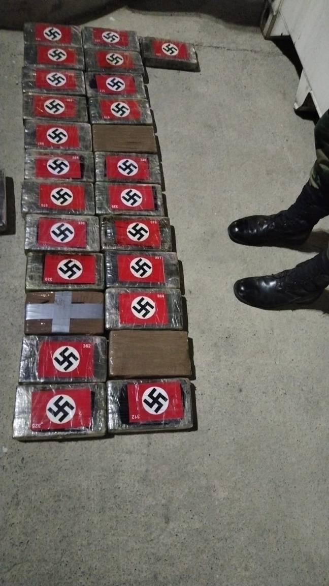 Each brick of cocaine was adorned with a red, white and black Nazi swastika flag. Credit: Newsflash