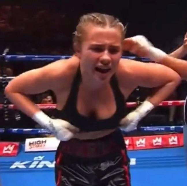 OnlyFans boxer Daniella Hemsley lifts her top to celebrate first ever