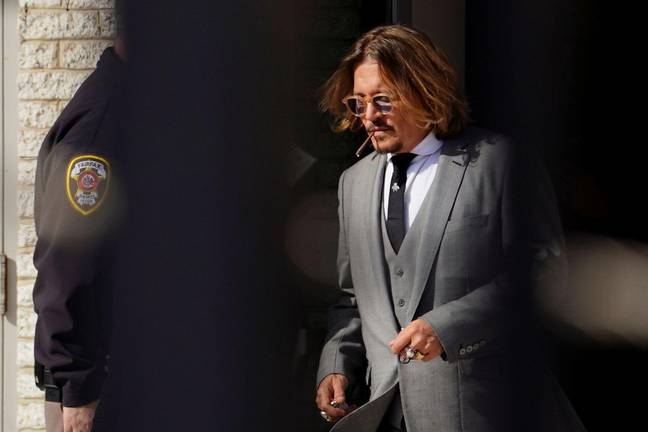 Viewers noticed that Heard wore a bee emblem tie, like Depp. Credit: Alamy