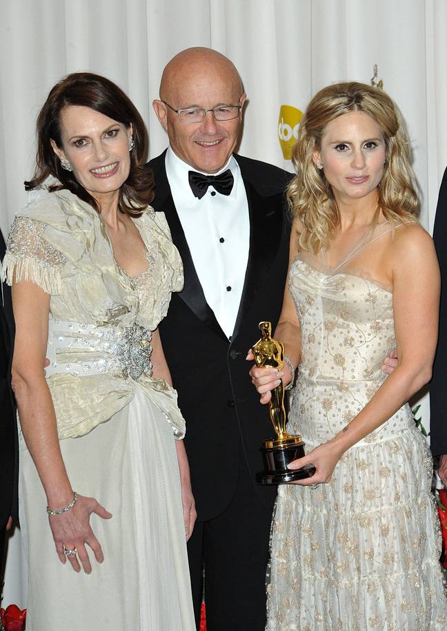 Sally Bell (L), Kim Ledger (middle) and Kate Ledger (R) accept Heath Ledger's award for Performance by an Actor in a Supporting Role. Credit: Alamy