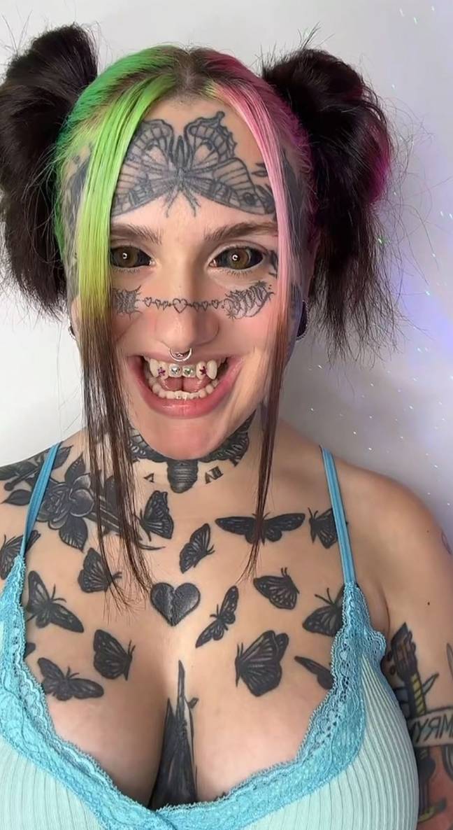 Kierstyn has fanged teeth, a split tongue and has even tattooed her eyeballs. Credit: Caters