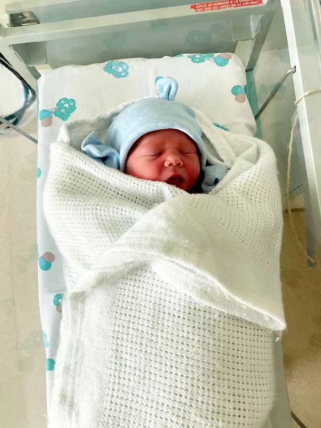 Harrison was born weighing 7lb 11oz. Credit: SWNS